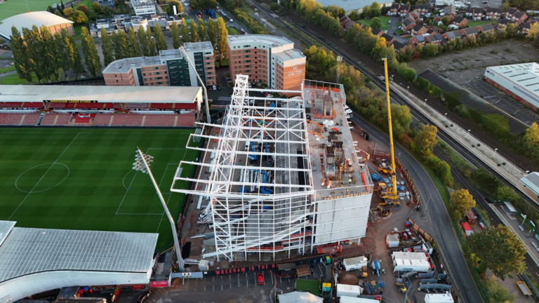 Wrexham fans react as club reveals stunning view from top of new Kop Stand. Credit: Roberts and Daughter